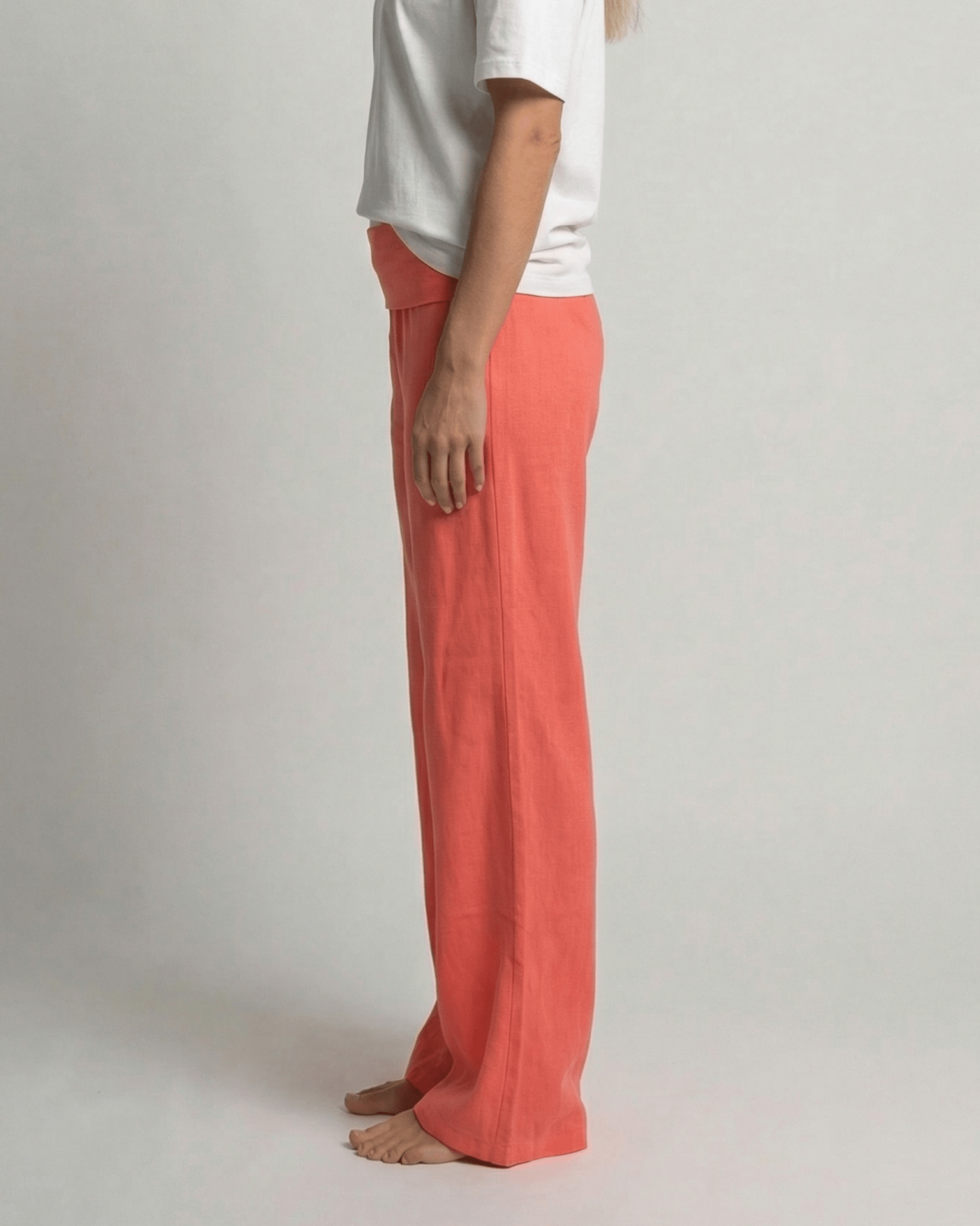 Sasha yoga pants i koral med bredt fold-down stykke og løs pasform