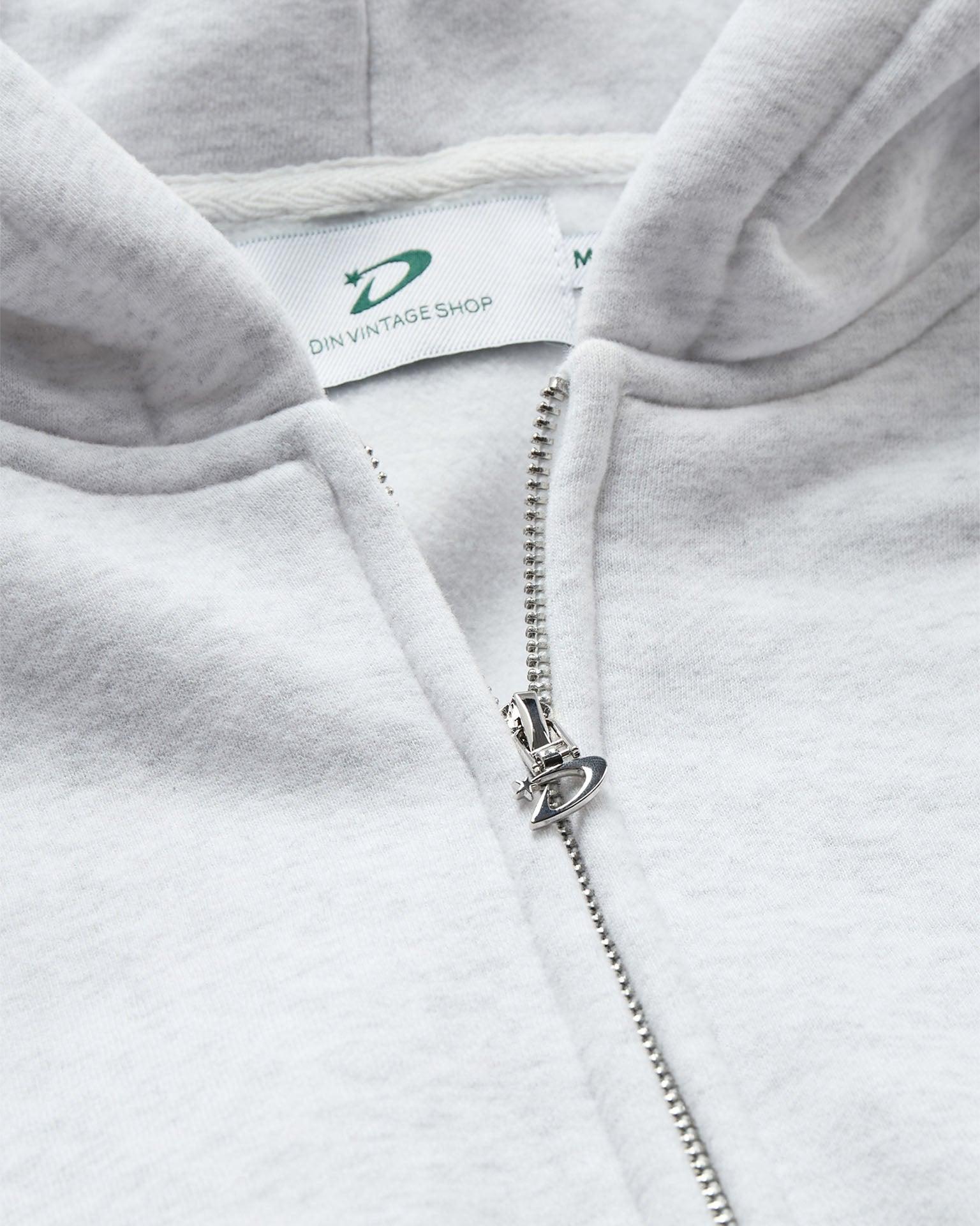 Lysegrå oversized zip hoodie i blød bomuld med lynlås og mærke fra Din Vintage Shop.